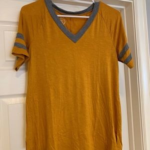 Rusty gold shirt with grey detailing, very soft